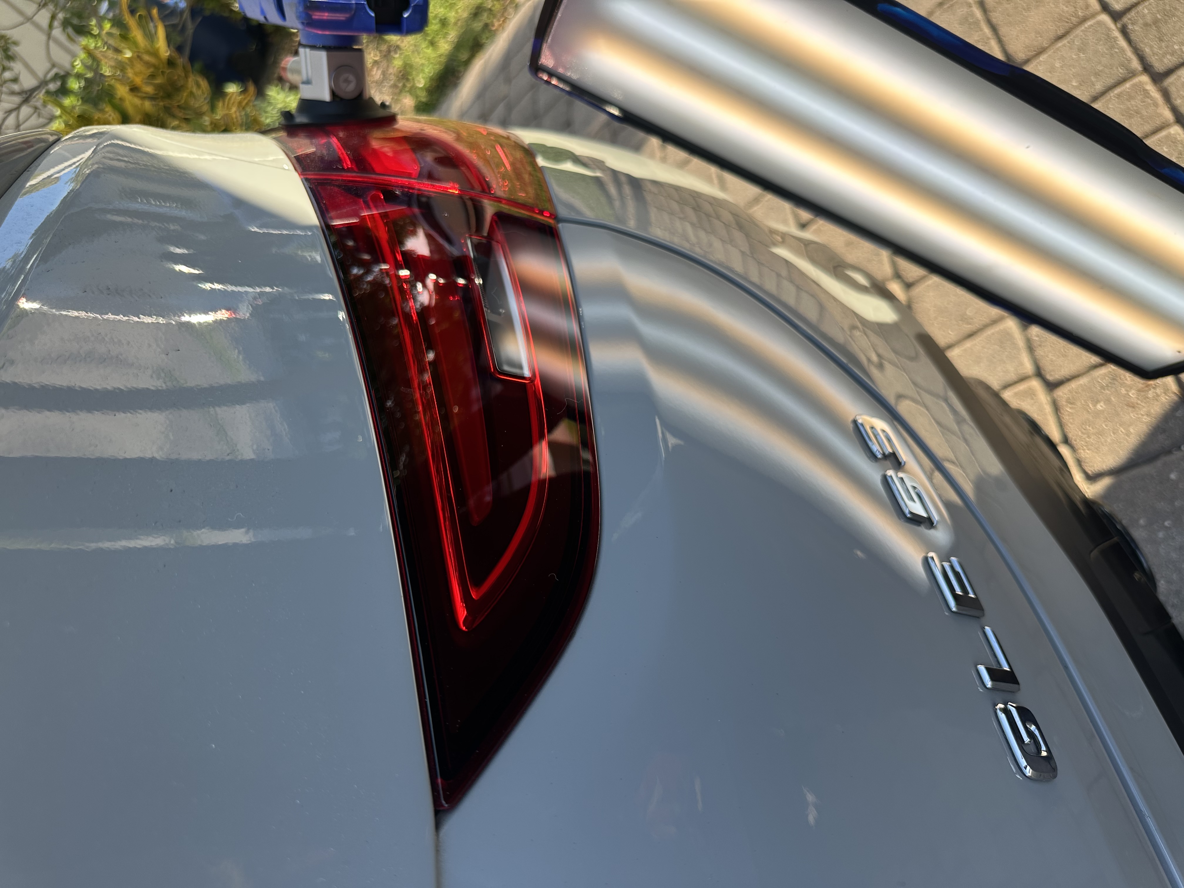 Silver Mercedes GLE quarter panel after paintless dent repair — smooth factory finish, Miami